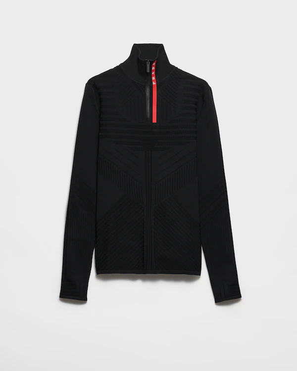 Pull col roulé technique